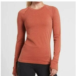 Athleta nwt Momentum Seamless Long Sleeve Top Size Small Orange Shimmer